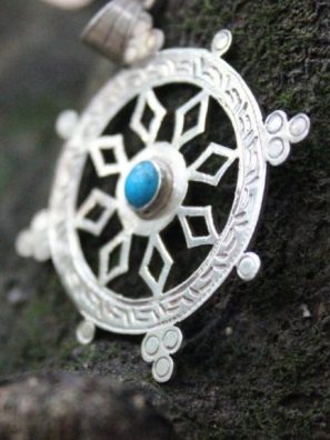 Dharma Chakra Pendant presents