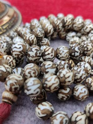 Om Bone Prayer Mala presents